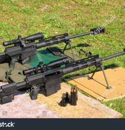 Stock-photo-two-sniper-rifles-bmg-caliber-on-shooting-range-with-bmg-cal-browning-machine-gun-was-206066674
